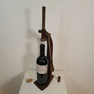 "Wesglasco" antique cast iron bottle capper in red